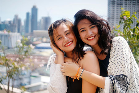 Two beautiful Filipino women smiling