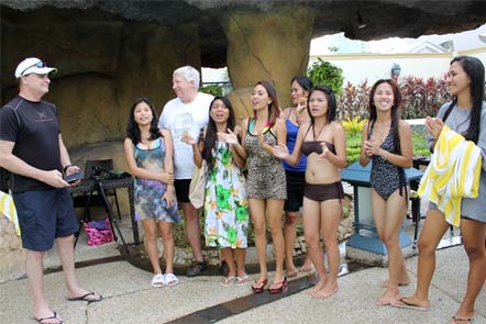 Cebu women singing at a tour